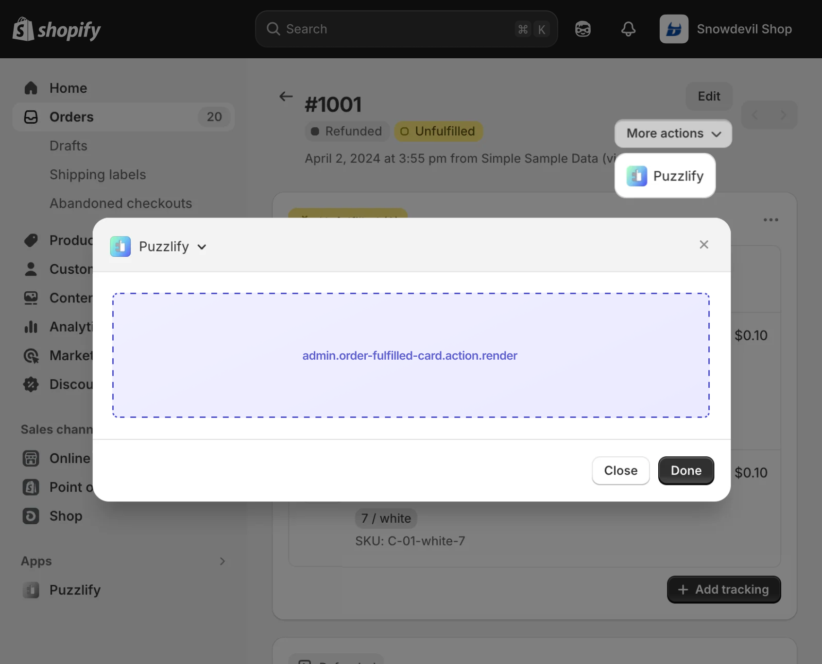 Shopify admin order page showing the fulfilled card section with a modal open for the action extension target.