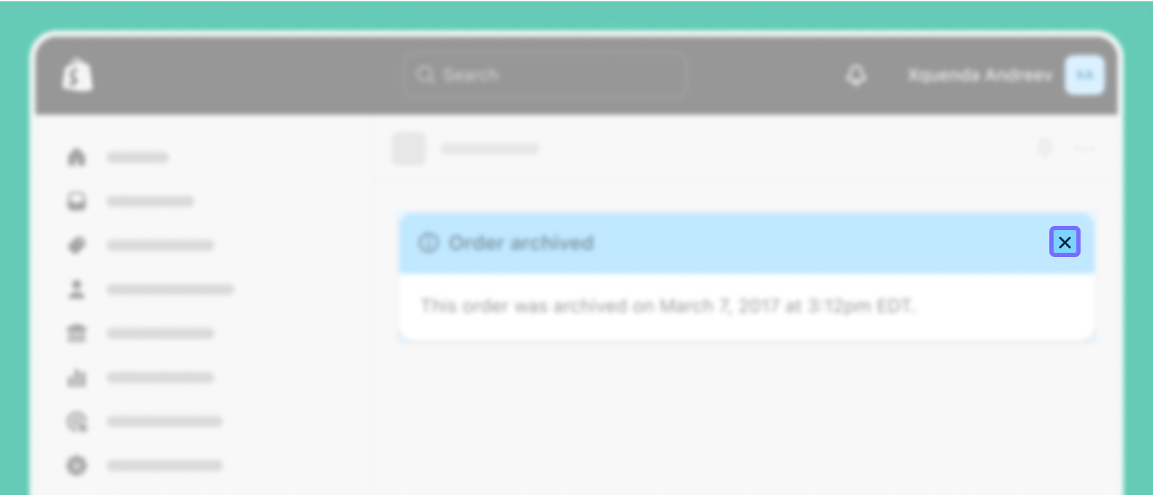 A blurred banner with the 'X' icon for dismissing it in focus.