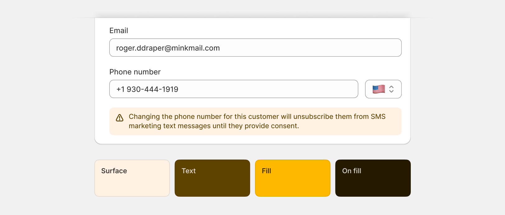 An example of a orange banner with the content 'Changing the phone number for this customer will unsubscribe them from SMS marketing text messages until they provide consent'.
