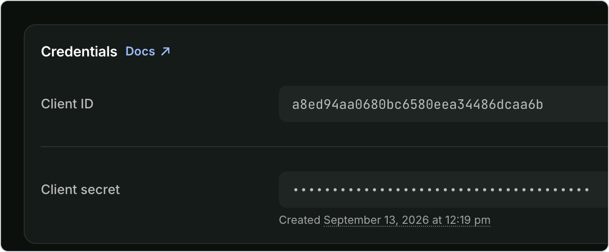 The Credentials card in an app's settings, showing the client ID and a hidden client secret with the date the credentials were created.