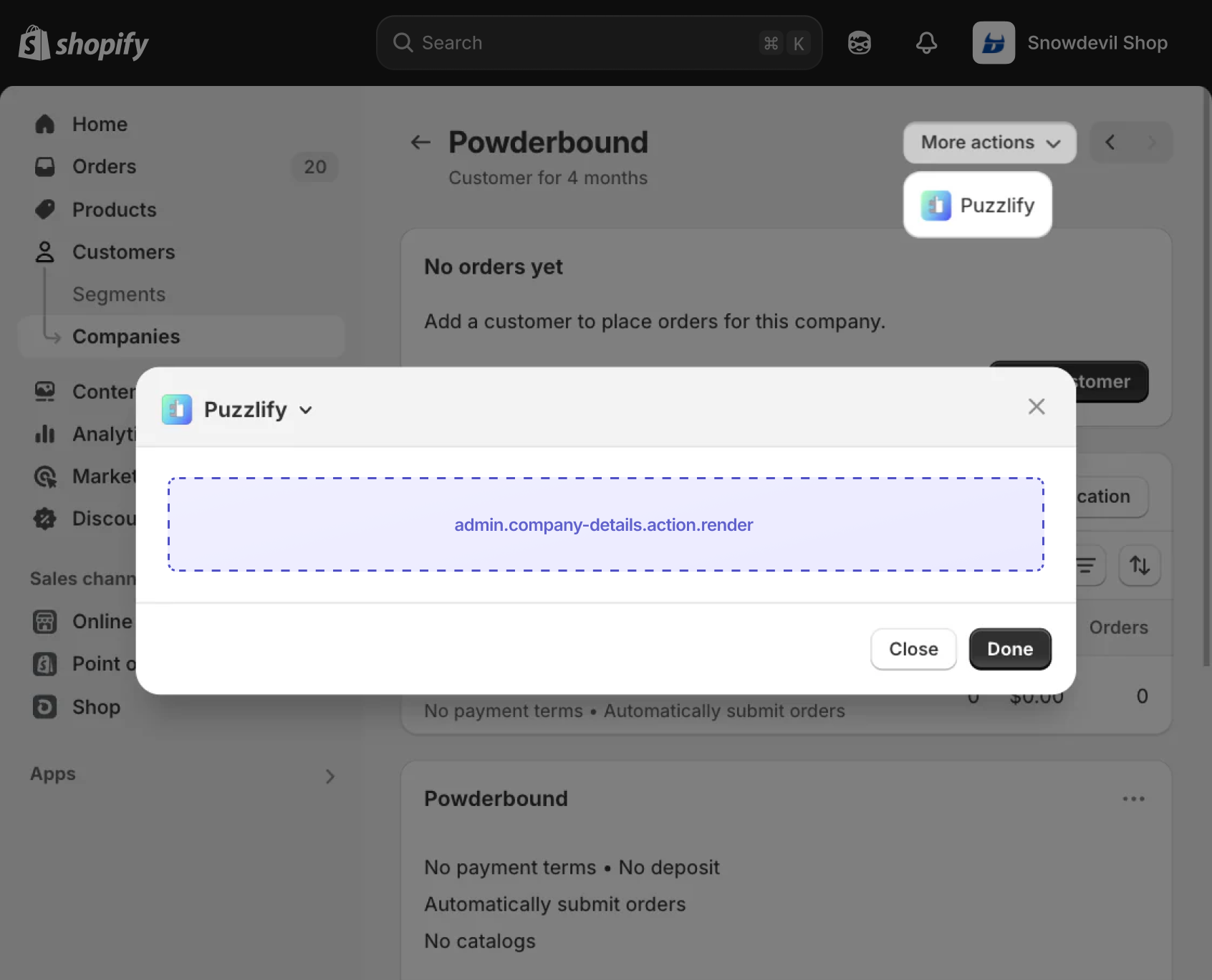 Shopify admin company details page with a modal dialog open, showing the extension target slot inside the modal.