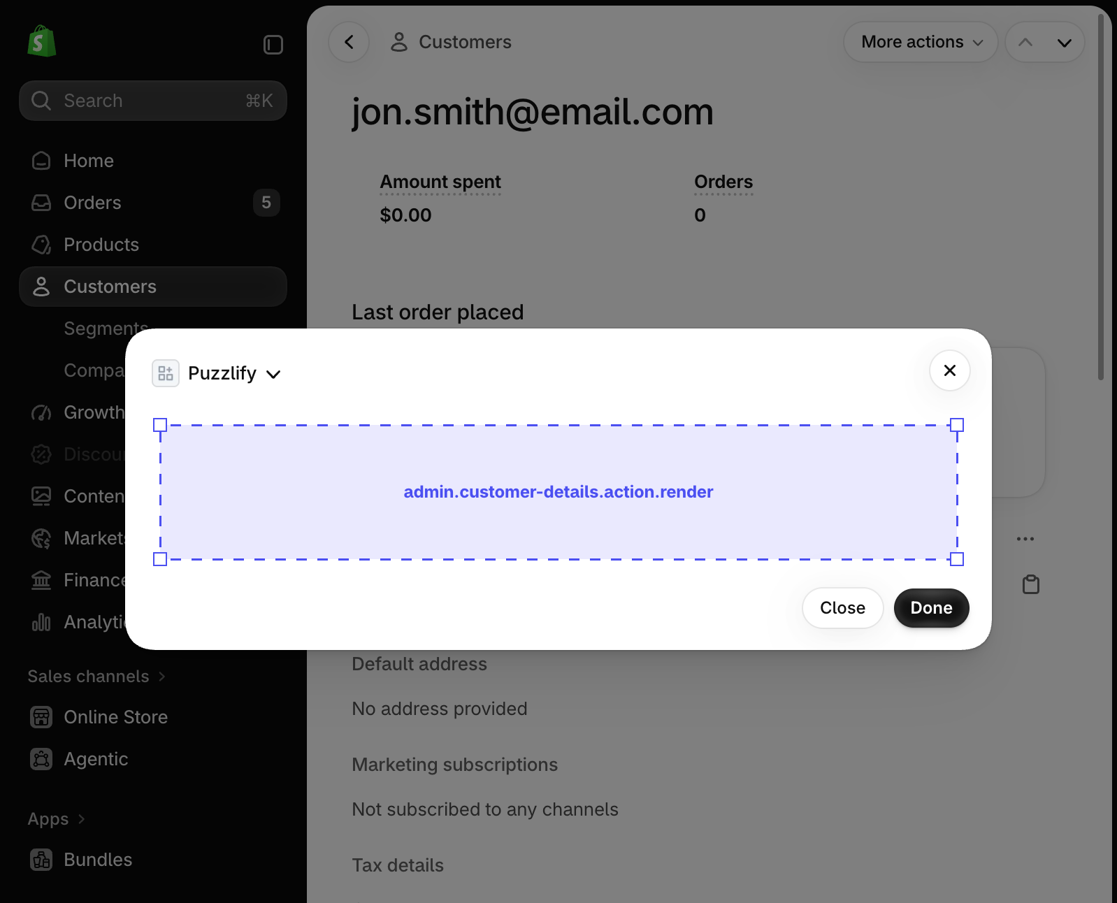 Shopify admin customer details page with a modal dialog open, showing the extension target slot inside the modal.