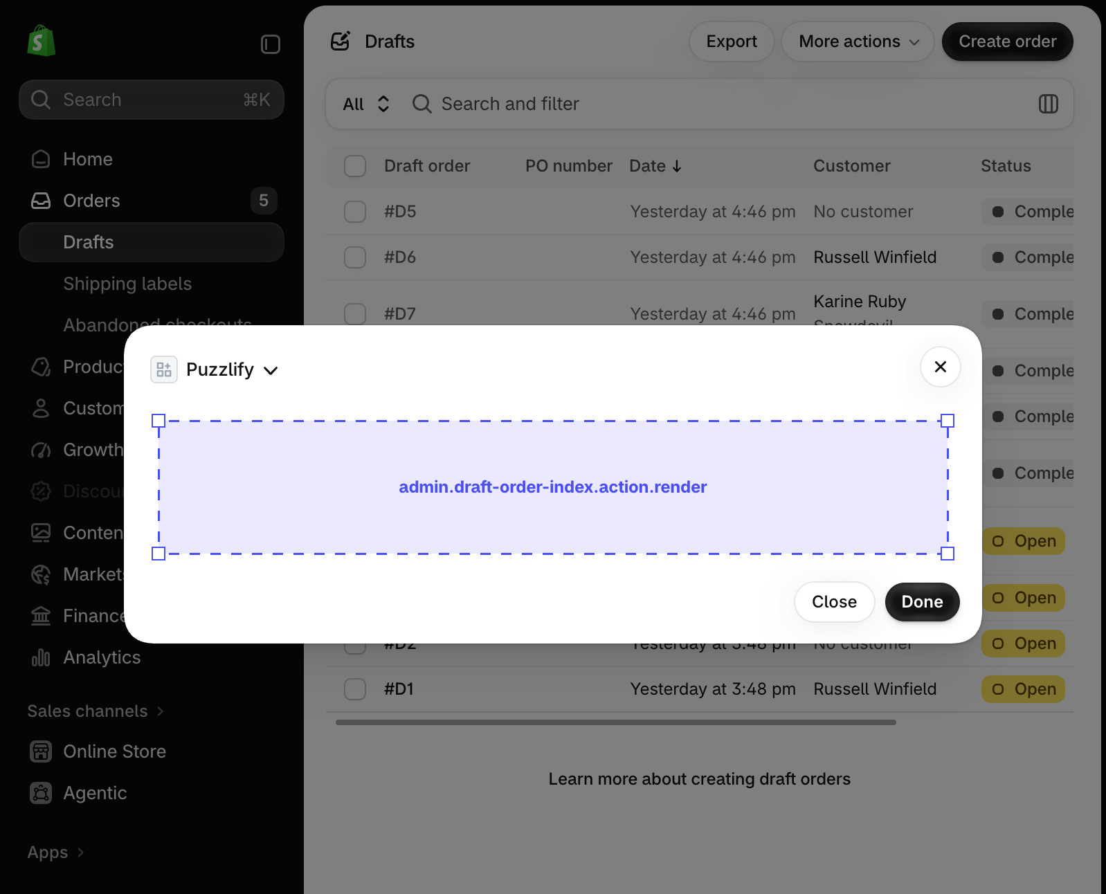 Shopify admin draft order index page with a modal dialog open, showing the extension target slot inside the modal.