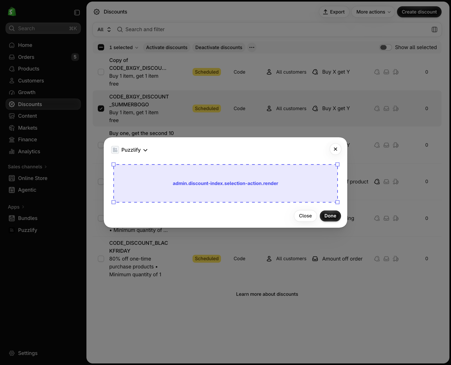Shopify admin discount index page with items selected, showing the extension target slot in the bulk actions bar.